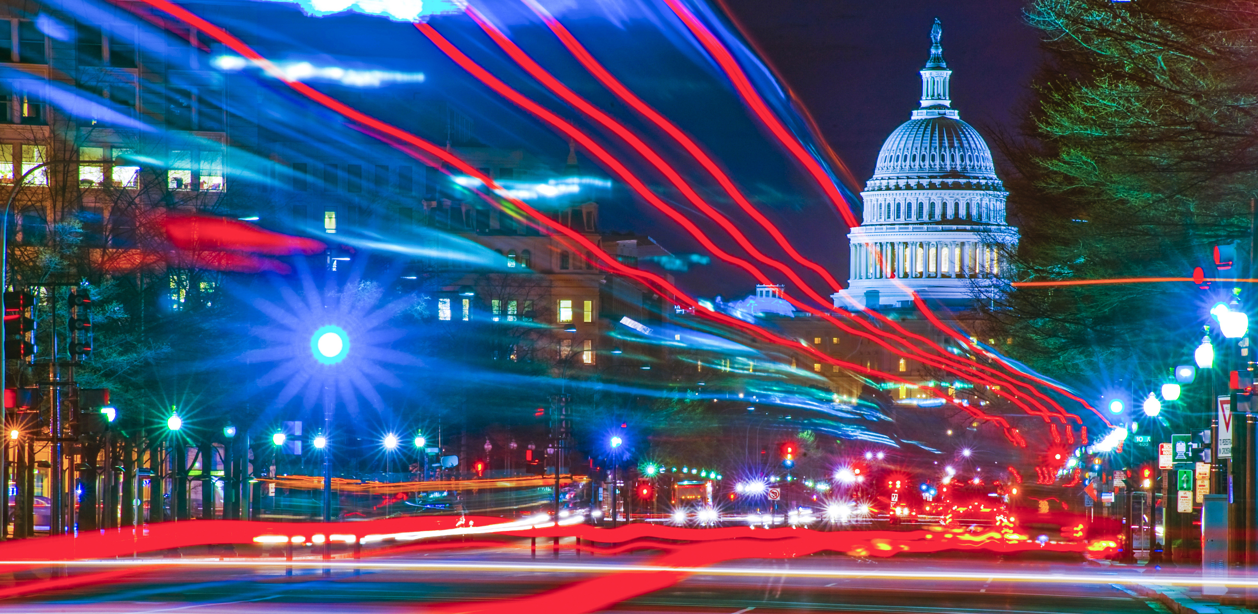 US Capitol at night with light trails